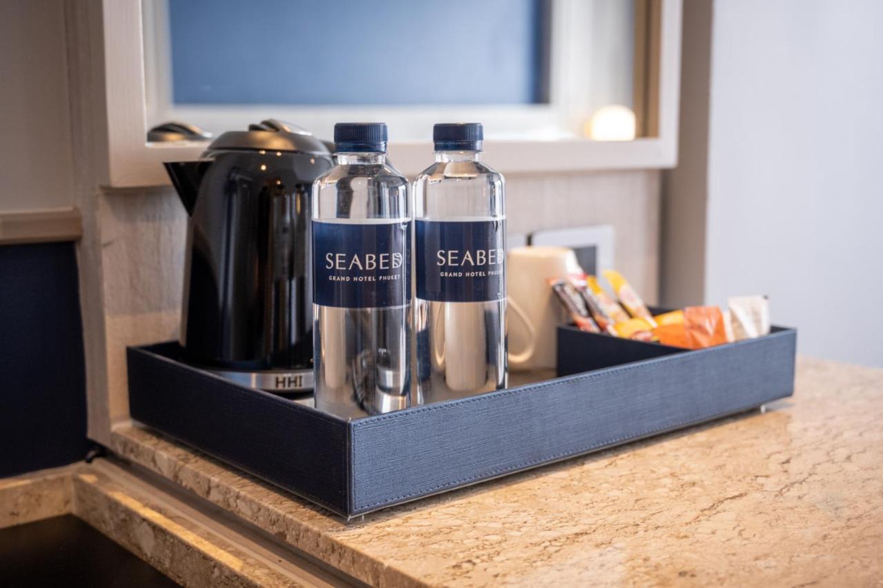 Seabed Grand Hotel Phuket - Sha Extra Plus Esterno foto SeaBear water bottles