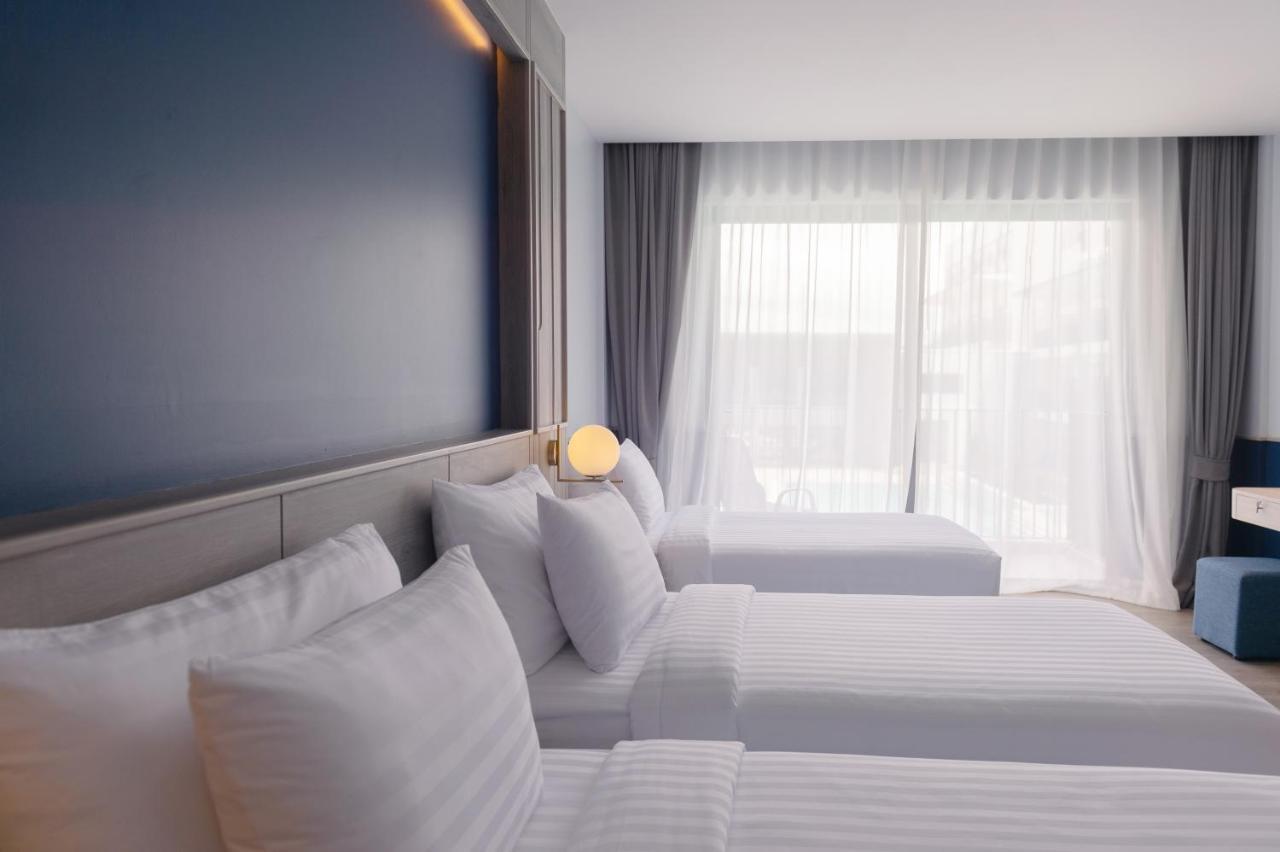 Seabed Grand Hotel Phuket - Sha Extra Plus Esterno foto A room at the hotel