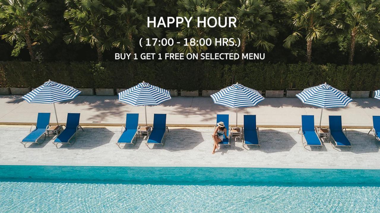 Seabed Grand Hotel Phuket - Sha Extra Plus Esterno foto Happy hour at a pool