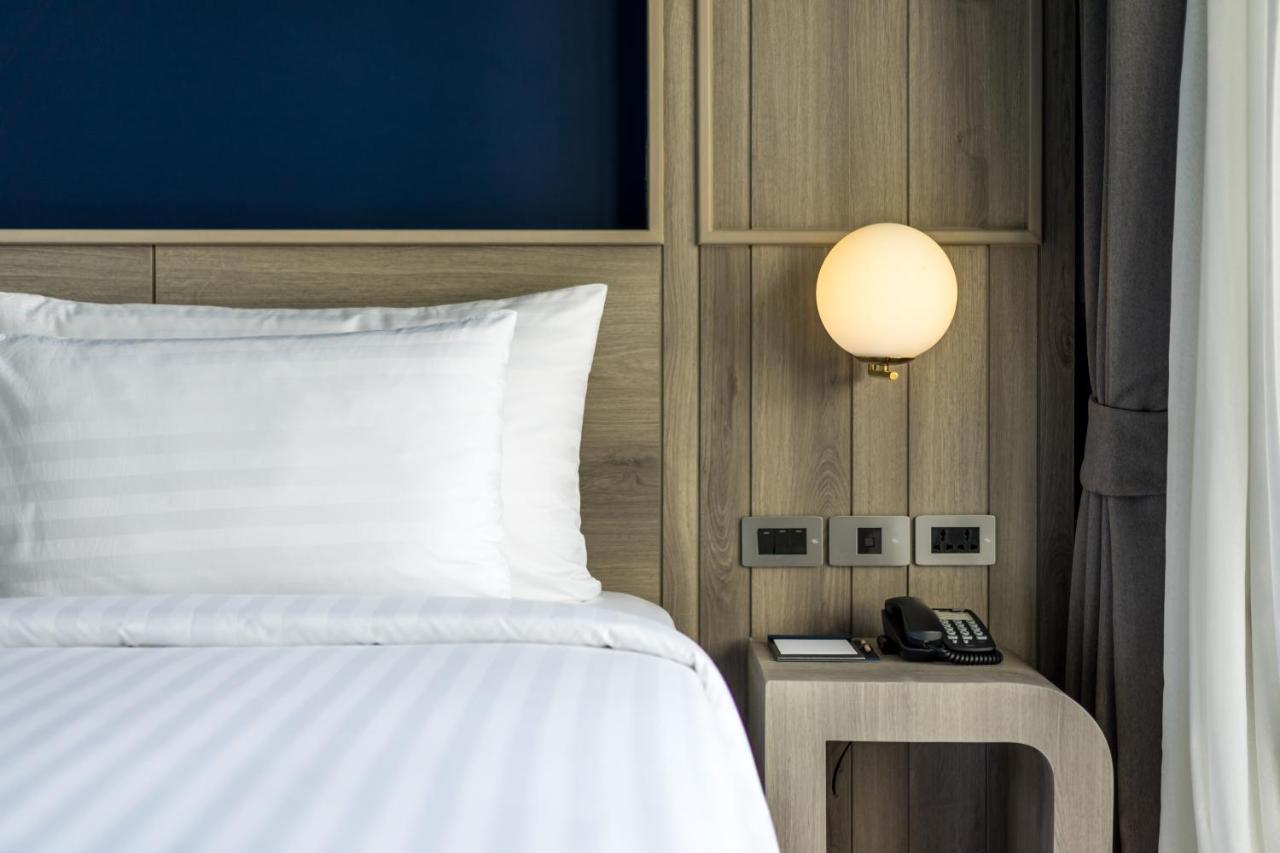 Seabed Grand Hotel Phuket - Sha Extra Plus Esterno foto A wall-mounted light